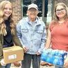 Tri-County R-VII School FCCLA members Tori Dustman and Emma Henderson deliver supplies to Norman Youngman.