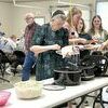 Community members gathered at the Spillman Center for the JCA Fish Fry on Friday, where they were served fish, hush puppies, french fries, cole slaw, baked beans and a variety of desserts.